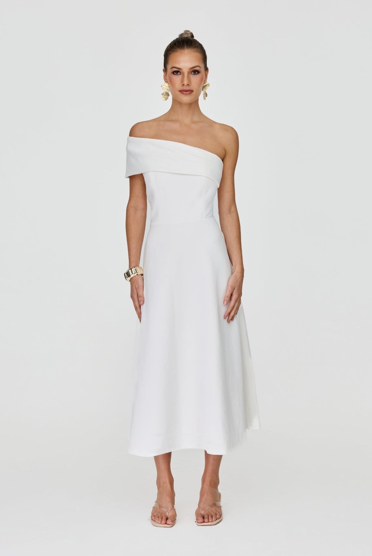 Woman wearing white one-shoulder Brooklyn midi dress, a polished Melbourne Cup outfit option
