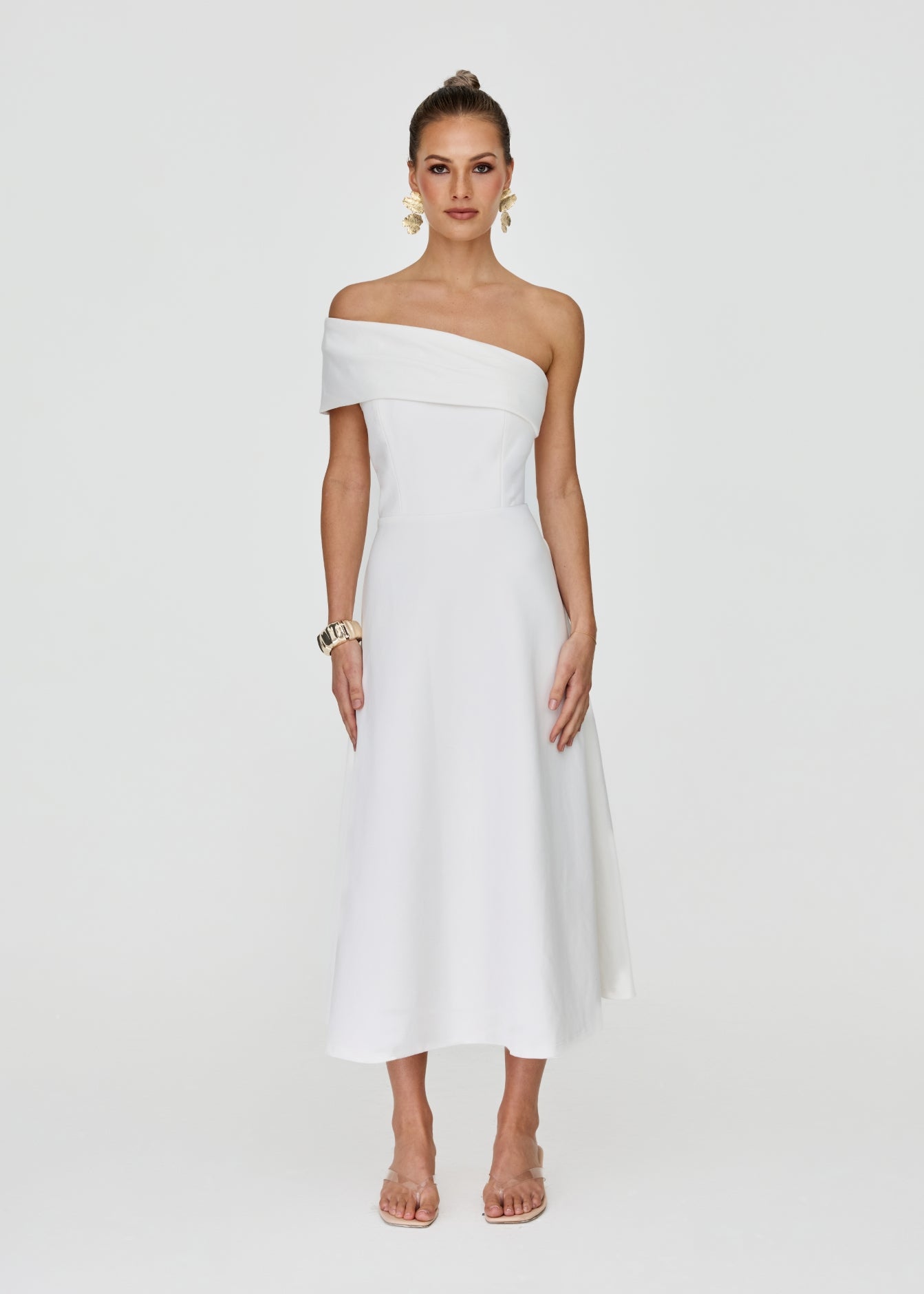 Woman wearing white one-shoulder Brooklyn midi dress, a polished Melbourne Cup outfit option