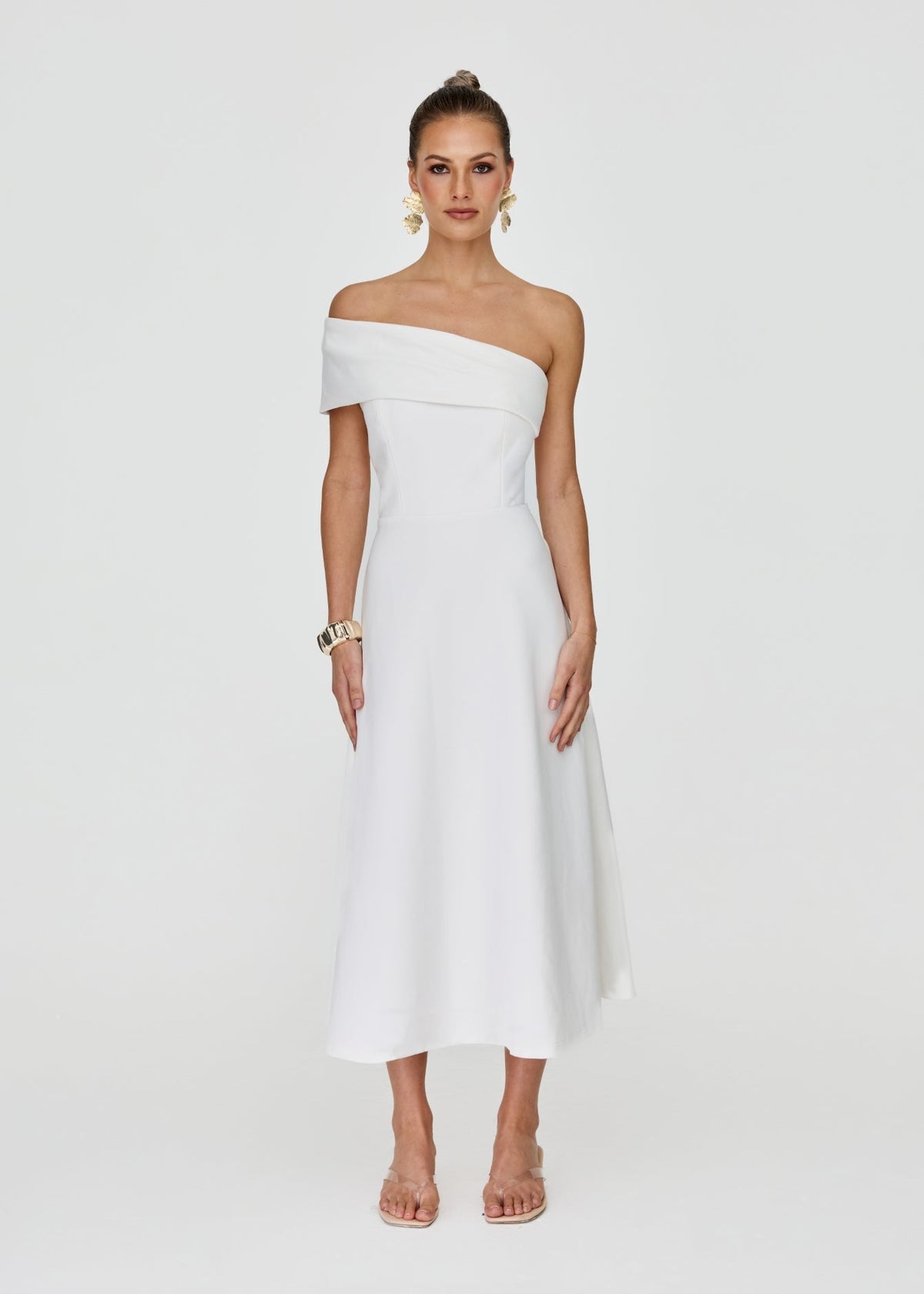 Woman wearing white one-shoulder Brooklyn midi dress, a polished Melbourne Cup outfit option